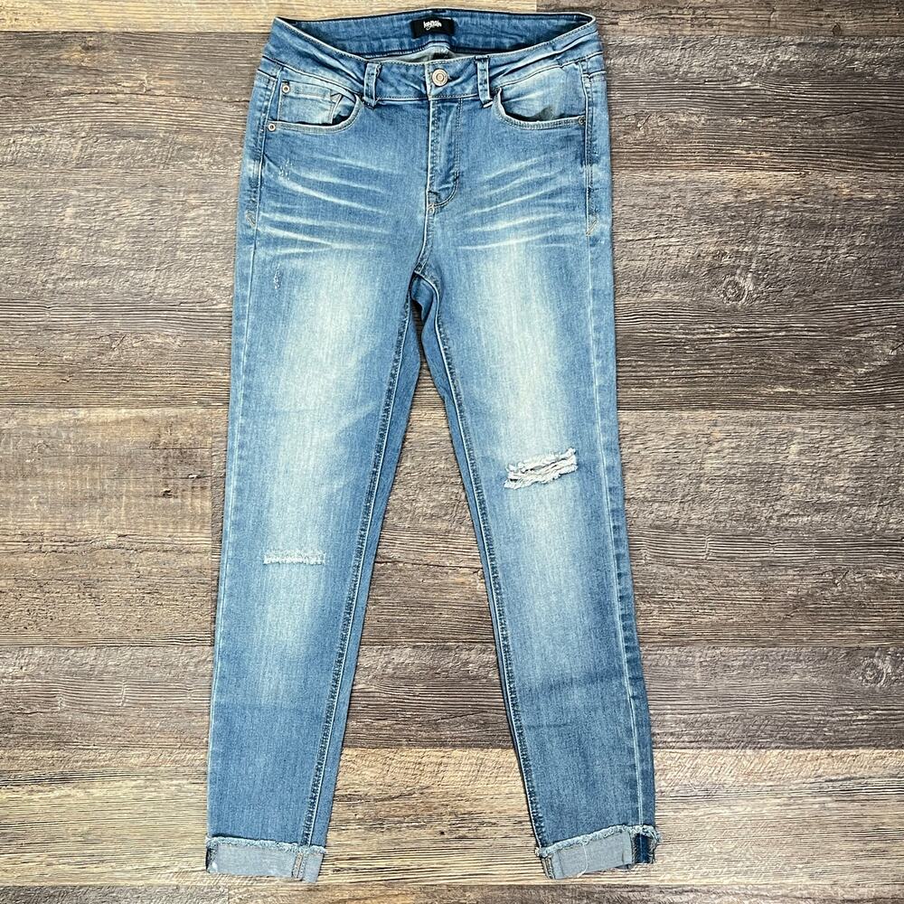 Kensie light wash distressed skinny jeans size 4/27 B179